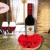 [Image: ¡Paga $28 en Lugar de $60 por Lindo Arreglo de 4 Rosas Preservadas + Botella de Vino Tinto!m]