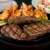 [Image: ¡Paga Q235 en Lugar de Q412 por Parrillada Mar y Tierra Para 2 Que Incluye: Lomito + Camarones A La Plancha, Al Ajillo o Empanizados + Chorizo + 1 Litro de Bebida + Guarniciones + Postre de Crepa de Nutella, Fresa y Banano + Café!m]