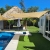 [Image: ¡Disfruta la Playa en Isola Beach House, Costa del Sol! ¡Paga $125 en Lugar de $250 por Estadía de 1 Noche Para Hasta 9 Personas en Casa Totalmente Equipada, Disponible Solo de Lunes a Viernes!m]
