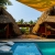 [Image: ¡Escapada Perfecta a la Playa! ¡Paga Q365 en Lugar de Q850 por 1 Noche para 2 Personas en Cabaña Tipo Hawaii con Baño Privado o Habitaciones Dobles con Baño Privado + Snacks de Desayuno + Uso de Instalaciones: Piscina, Hamacas y Más!m]