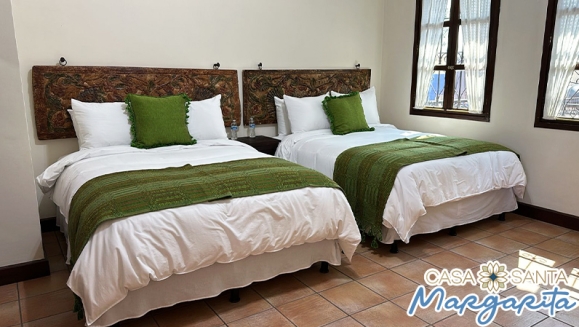 [Image: ¡Valido para fiestas agostinas! ¡Paga $75 en Lugar de $148.69 por Estadía Familiar en Antigua Guatemala para 2 Adultos y 2 Niños (Hasta 9 años) en Habitación Doble, TV, Parqueo, Impuestos Incluidos y Más!m]