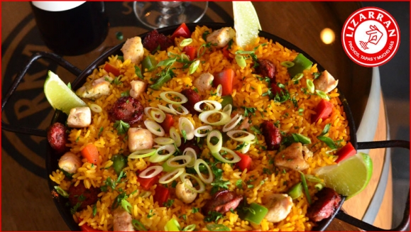 [Image: ¡Paga $18 en Lugar de $36 por Menú para Llevar que Incluye: 1 Paella de Carnes para 2 Personas + 1 Botella de Vino Sol de Chile, Merlot o Cabernet!m]