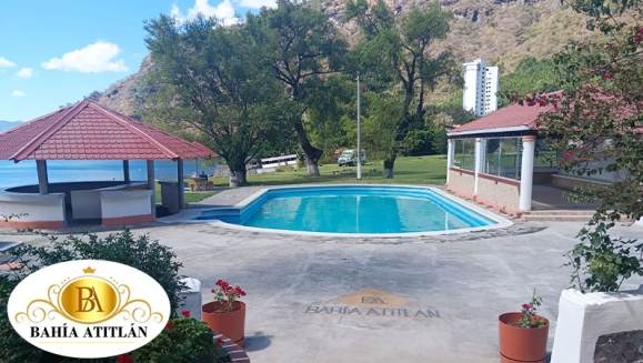 [Image: ¡Disfruta en Bahía Atitlan! ¡Paga Q350 en Lugar de Q650 por Estadía de 1 Noche Para 2 Personas en Habitación Doble + Uso de Piscina, Vista al Lago y Volcanes, Acceso a Playa Privada y Área Verde + Impuestos Incluidos!m]