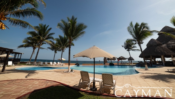 [Image: ¡Playa, Relax y Confort en el Hotel Cayman Suites! ¡Paga Q737 en Lugar de Q1,046 por Estadía en Habitación Sencilla o Doble Para 2 Adultos y Hasta 2 Niños + Uso Ilimitado de Atractivas Instalaciones + Impuestos Incluidos!m]