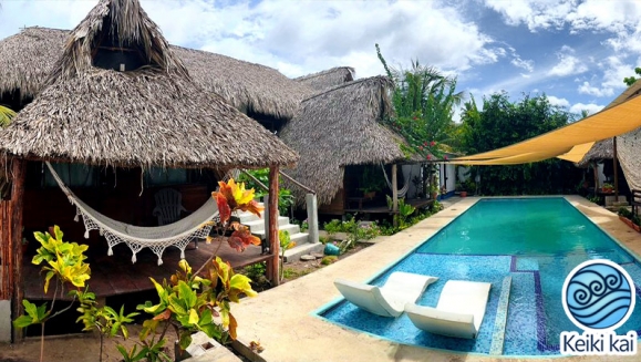 [Image: ¡Escapada Perfecta a la Playa! ¡Paga Q349 en Lugar de Q850 por 1 Noche para 2 Personas en Cabaña Tipo Hawaii con Baño Privado o Habitaciones Dobles con Baño Privado + Snacks de Desayuno + Uso de Instalaciones: Piscina, Hamacas y Más!m]